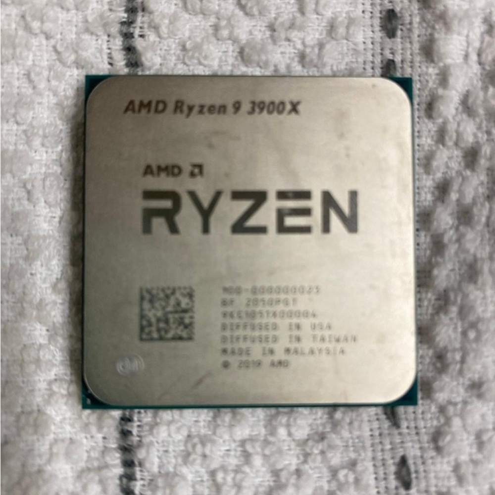 AMD Ryzen 9 3900X CPU - Silver and Black
